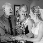 wedding photo of the bride and her happy parents