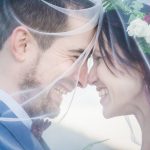 Christchurch wedding photo of bride and groom under the cove of the veil