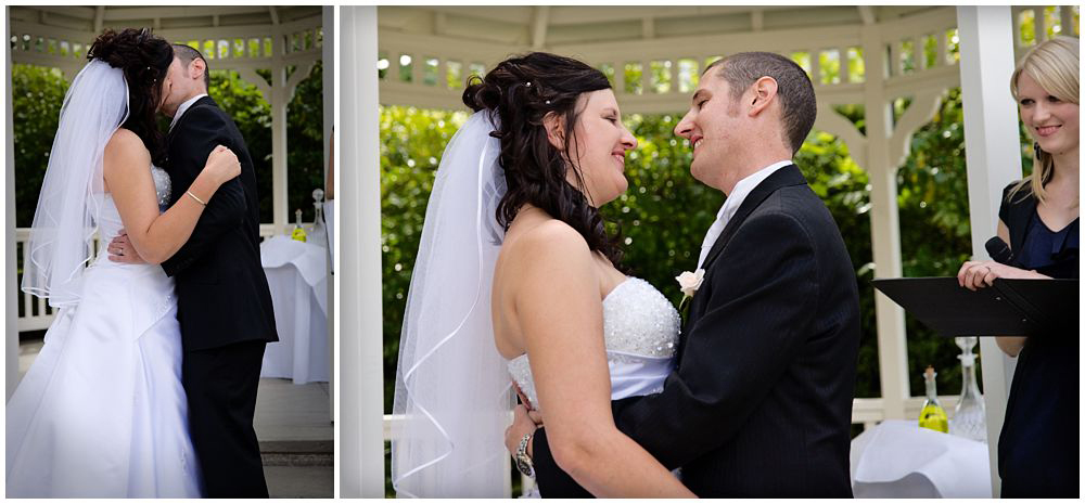 couple kissing on wedding day by christchurch wedding photographers Pip and Oz