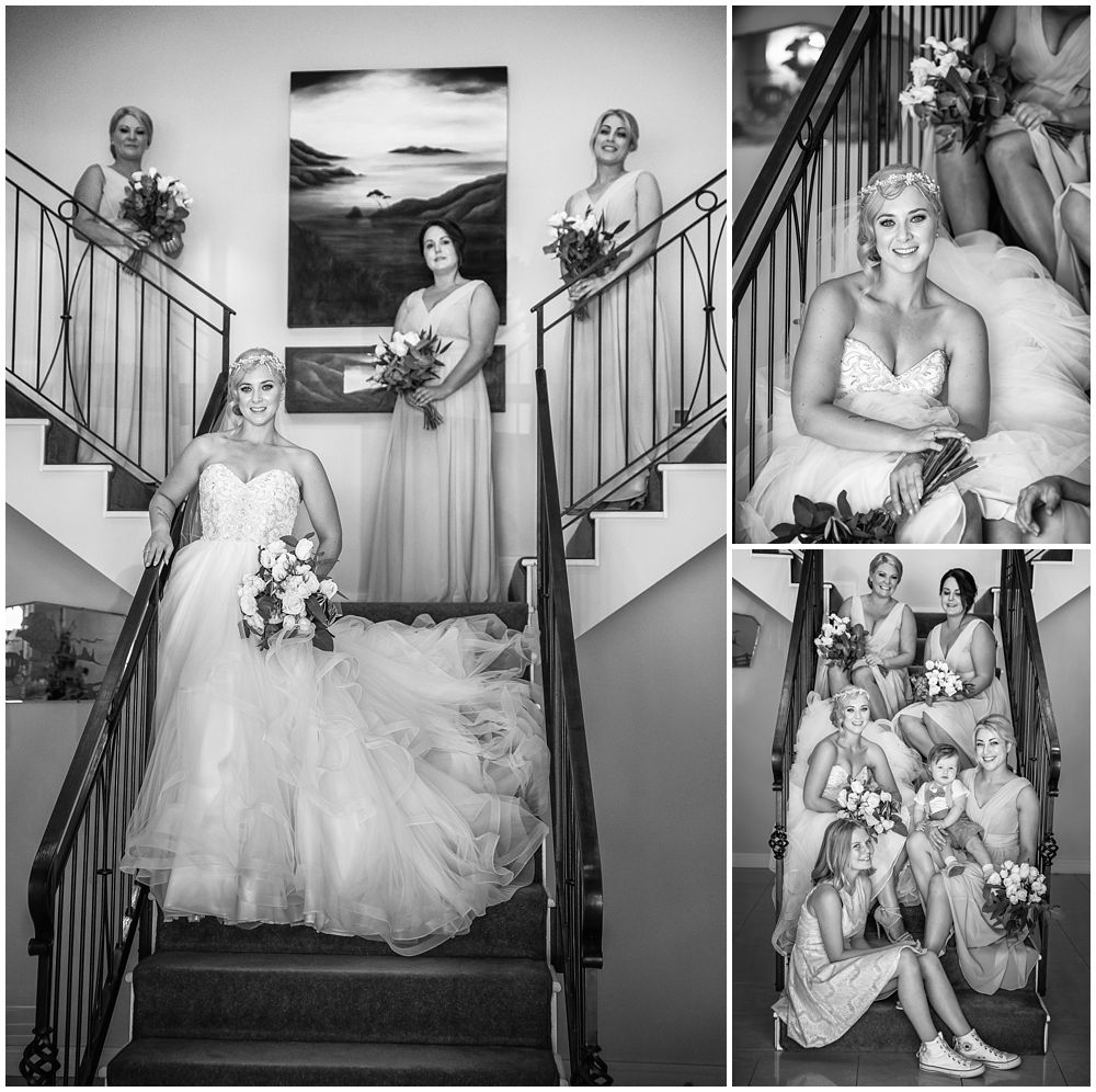 bride with girl on stairs at Flaxton Manor