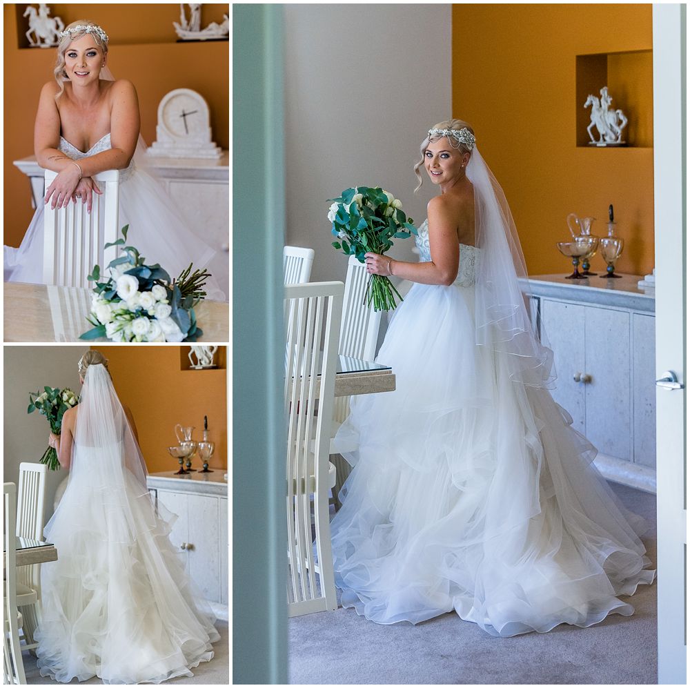 Bride in dress holding flowers at Flaxton Manor