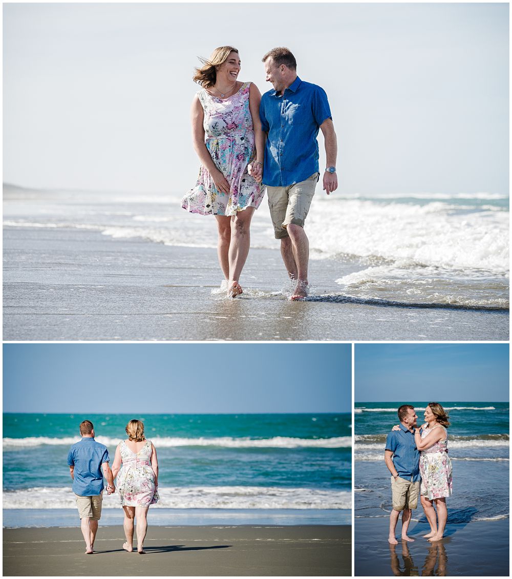 Couple walking on the beach at engagement shoot