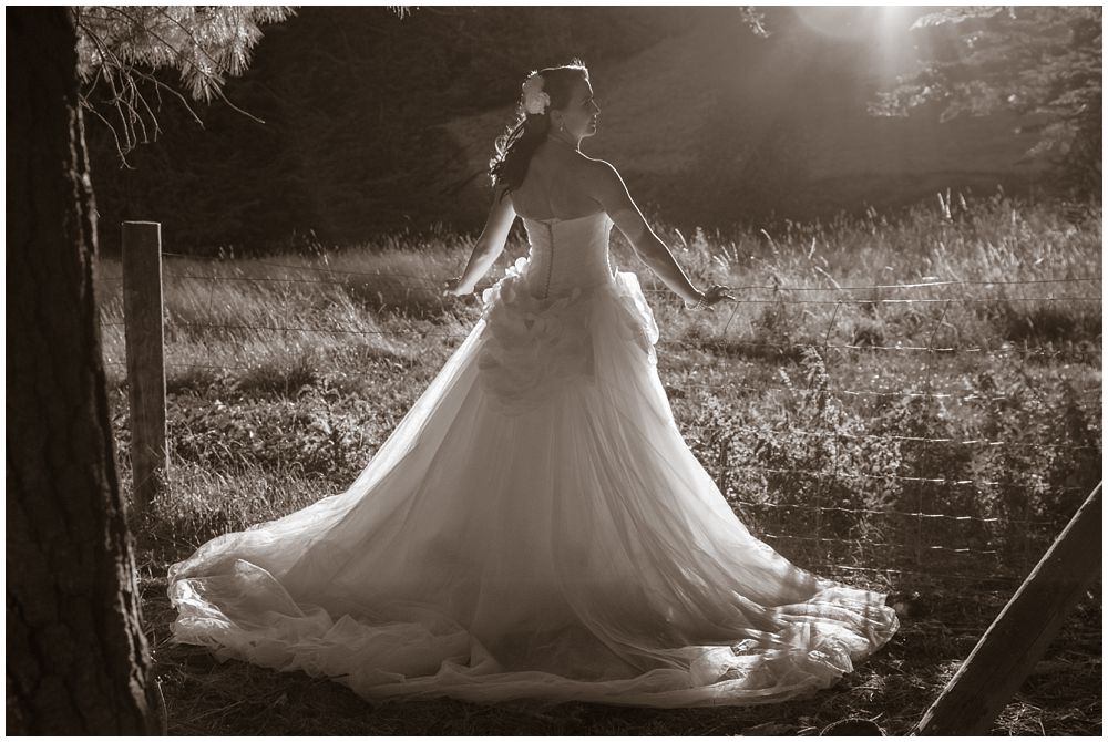 Tipapa Woolshed Barn Wedding Venue bride backlit by sun