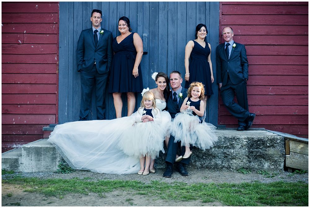 Bridal party infant of barn door Tipapa Woolshed Barn Wedding Venue