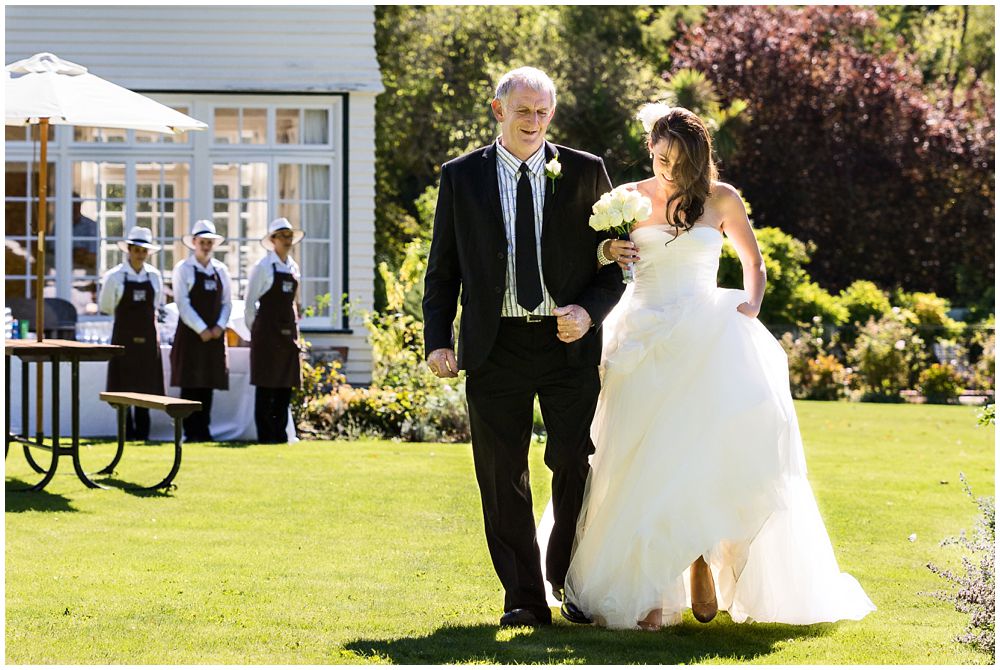 Tipapa Woolshed Wedding Venue bride walks down aisle with father