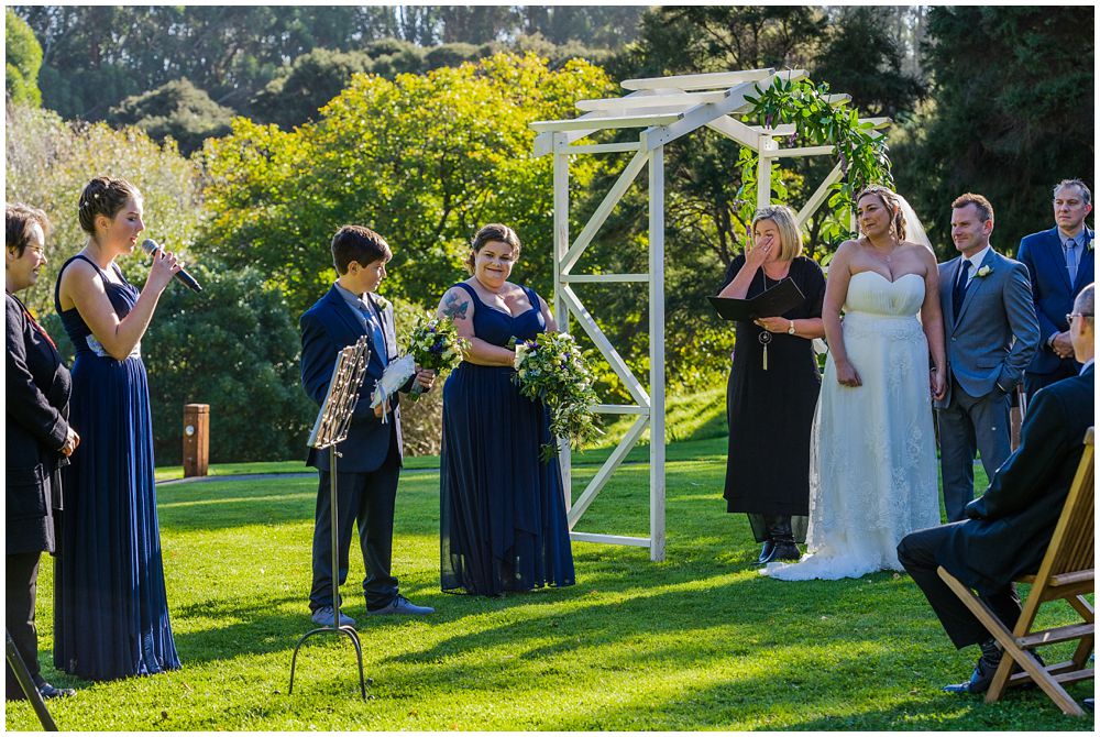 bride and groom listening to wedding song