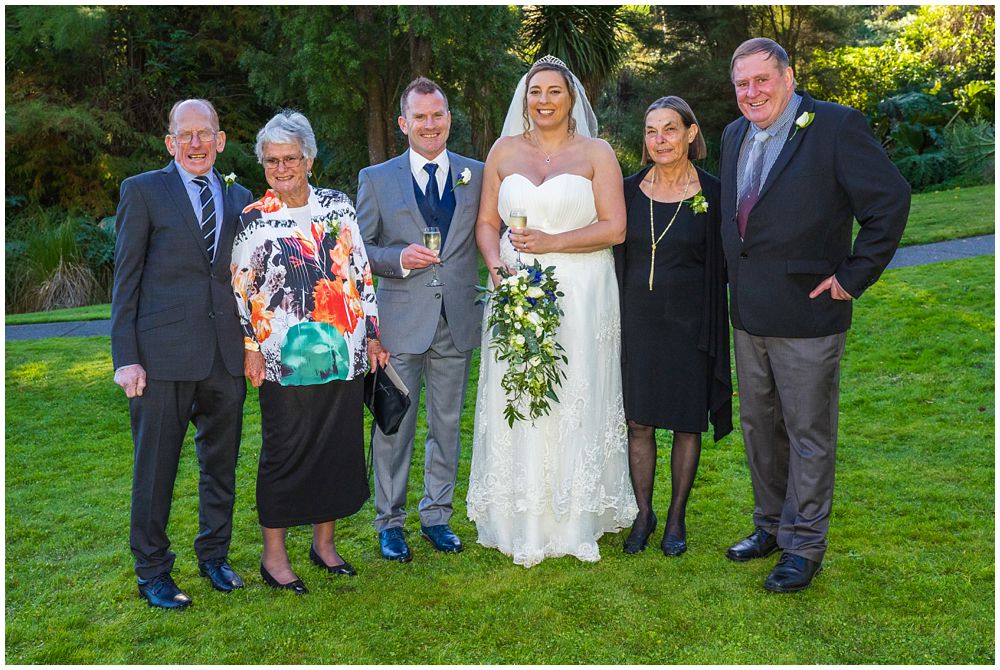 bride and groom with parents