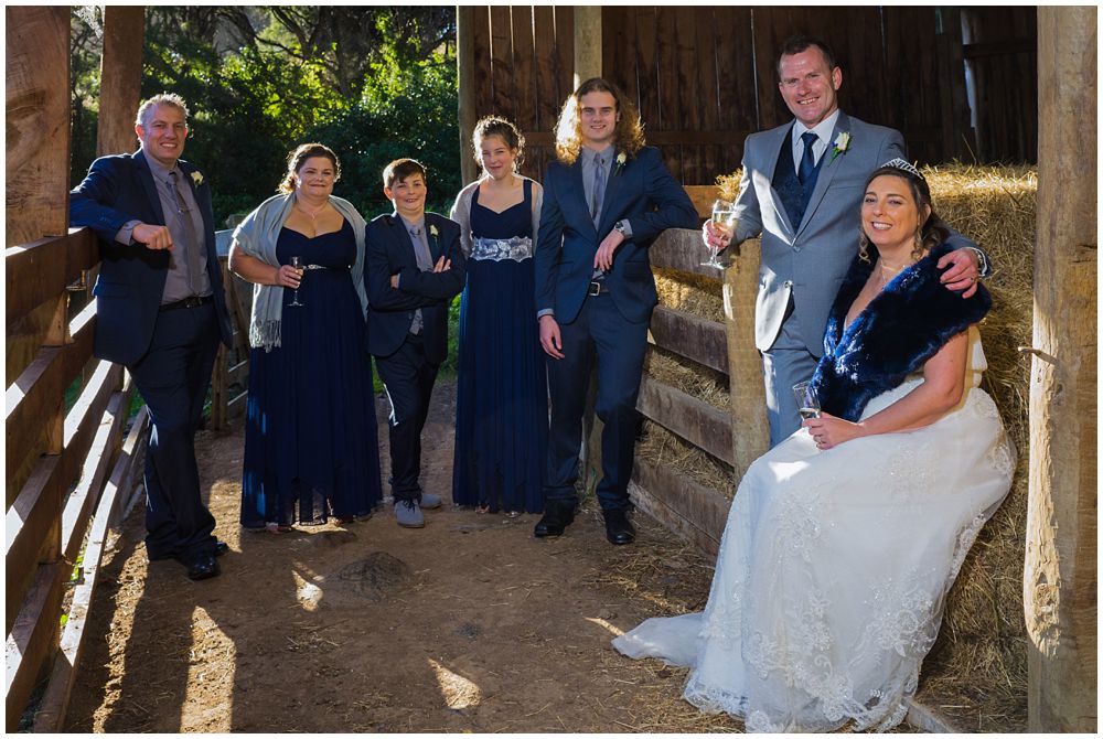 bridal party in barn