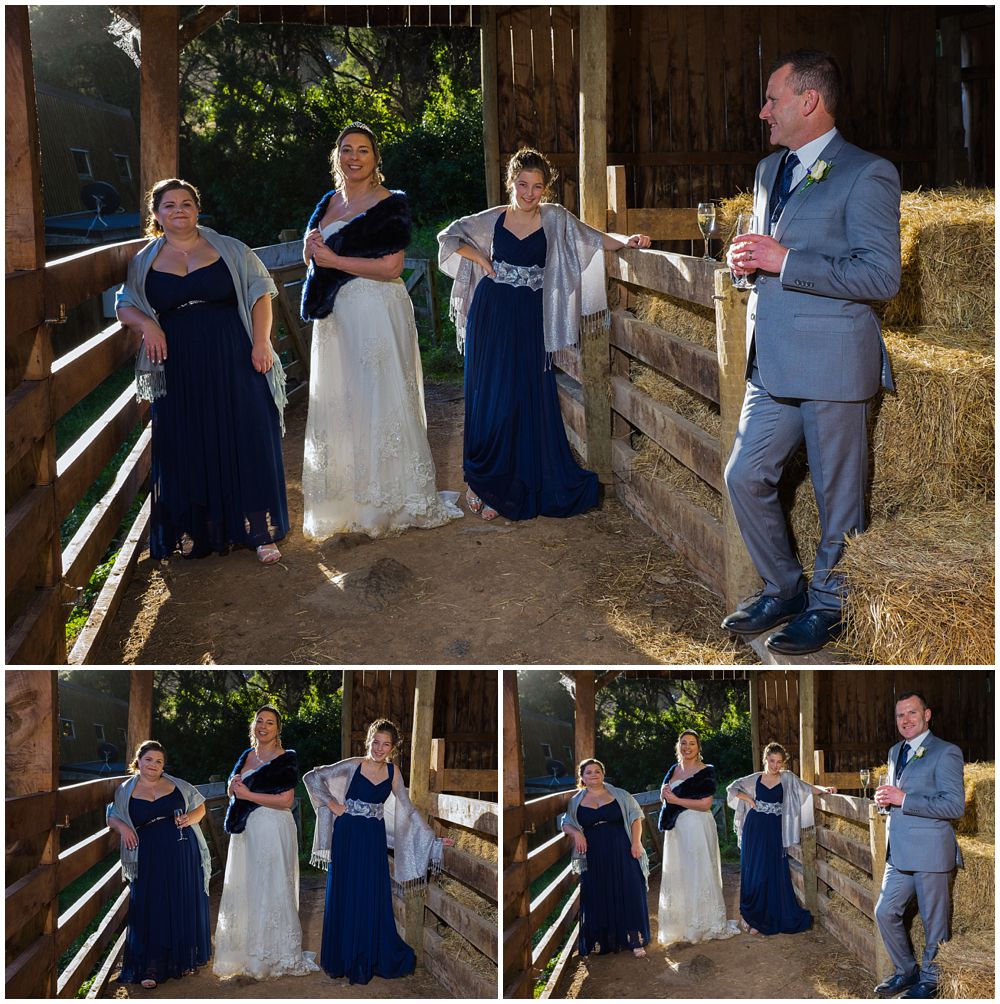 groom and girls in a barn