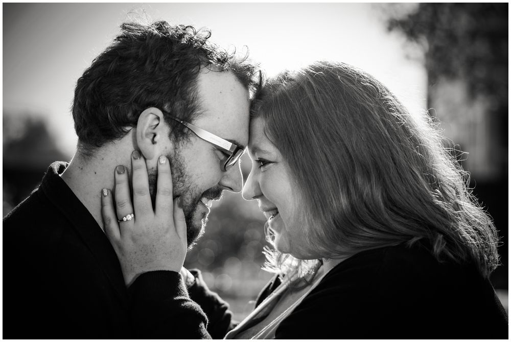 engaged couple having eskimo kiss