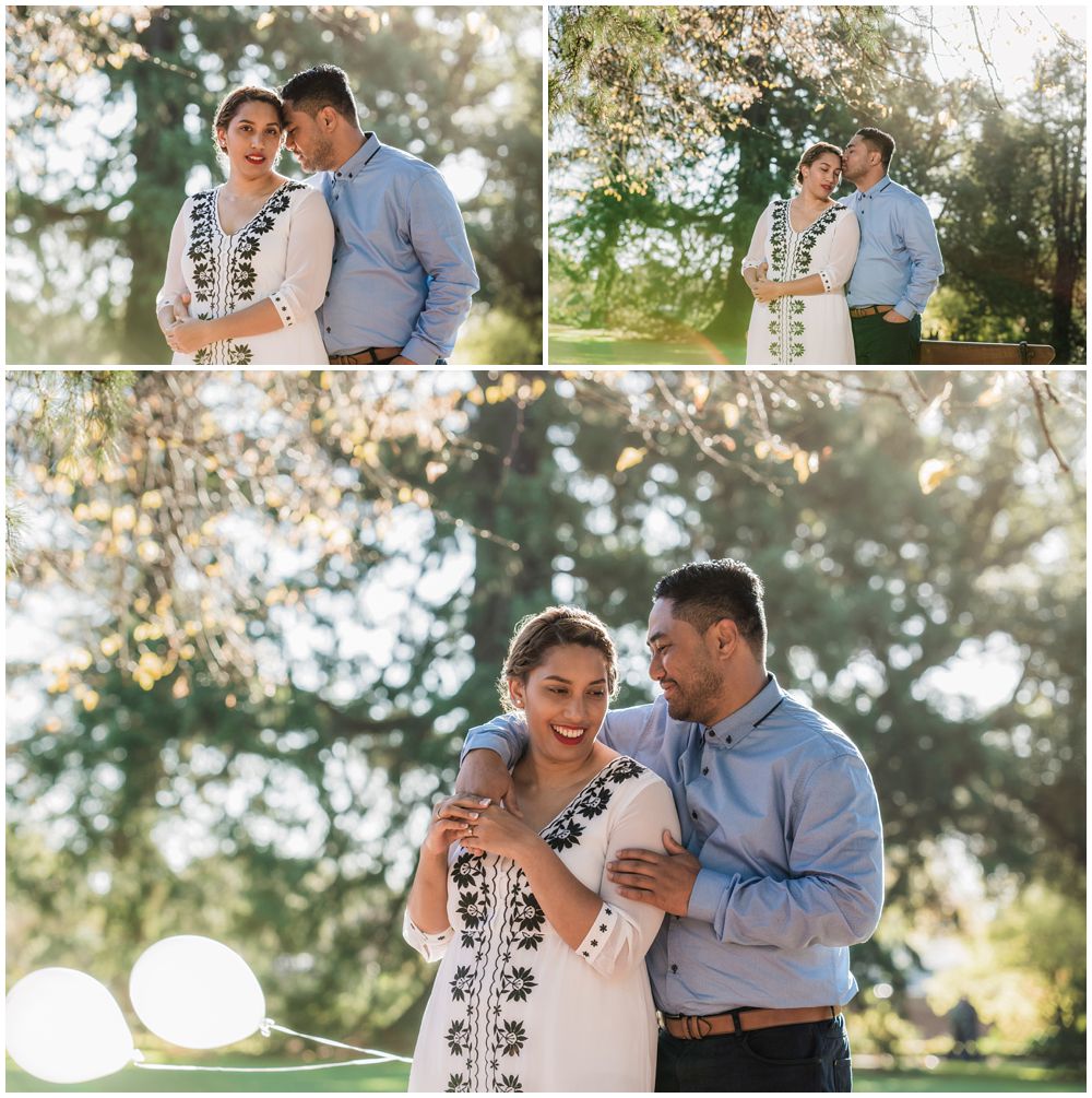 loving couple under a tree in botanic gardens Christchurch