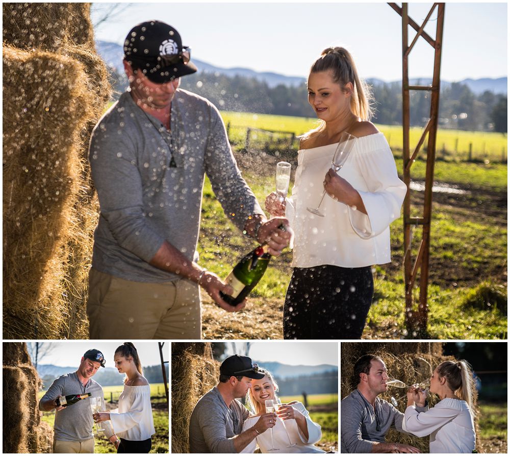 Couple posing and drinking a bottle of bubbles